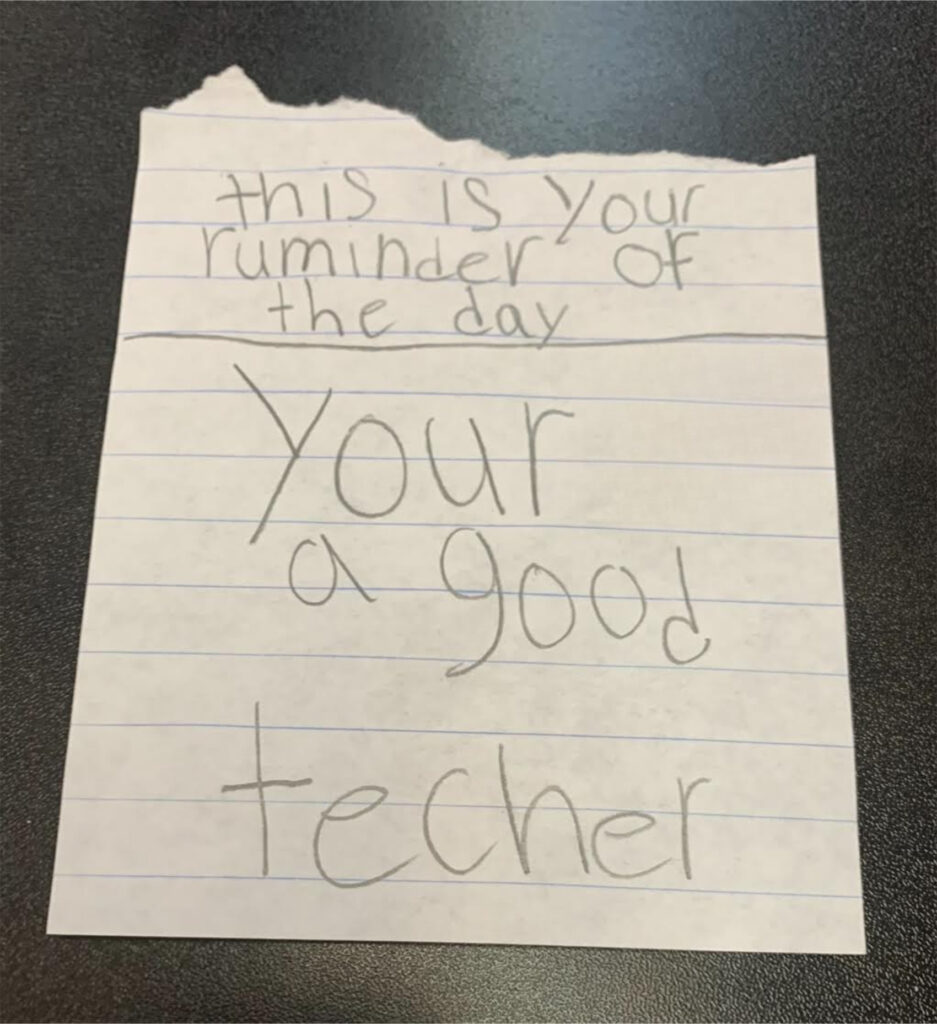 elementary student note that says "this is your ruminder of the day: your a good techer"